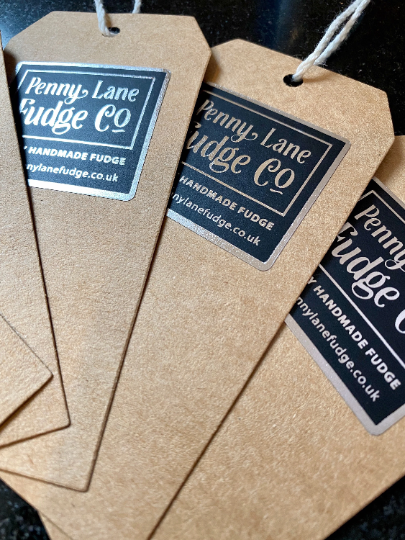 Penny Lane Fudge Co tags on brown paper with a black background