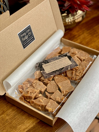 Box of scottish tablet with a label on a wooden surface