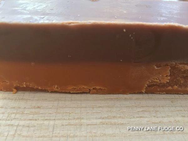 Rich chocolate fudge slice infused with vibrant orange twist, smooth and indulgent.