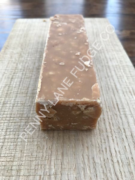 Bar of stem ginger fudge from Benny Lane Fudge Co on a textured surface